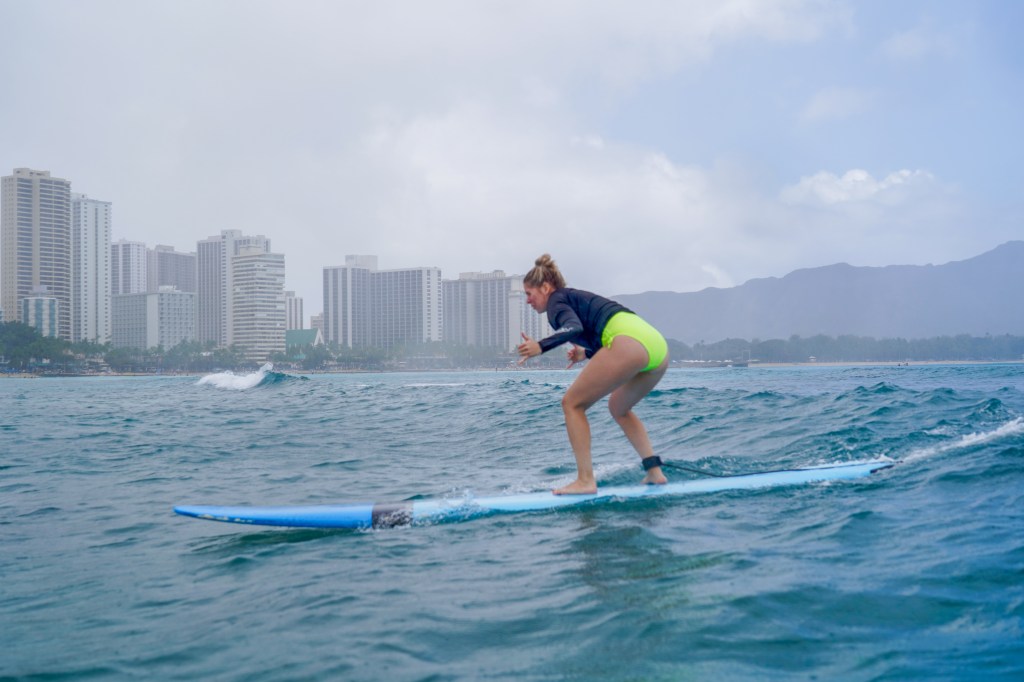 Surfing at Waikiki Beach, in Oahu Hawaii