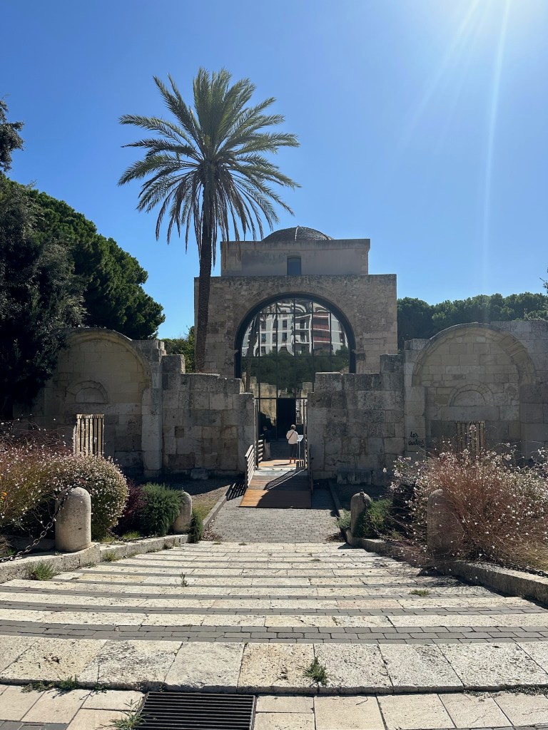 Basilica di San Saturnino Church with the sun shining 