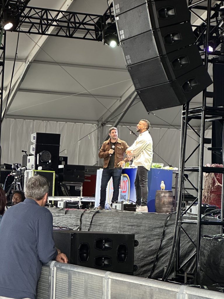 Jason Biggs hosting a cooking show with band member of O.A.R at Oceans Calling Festival in Ocean City, Maryland