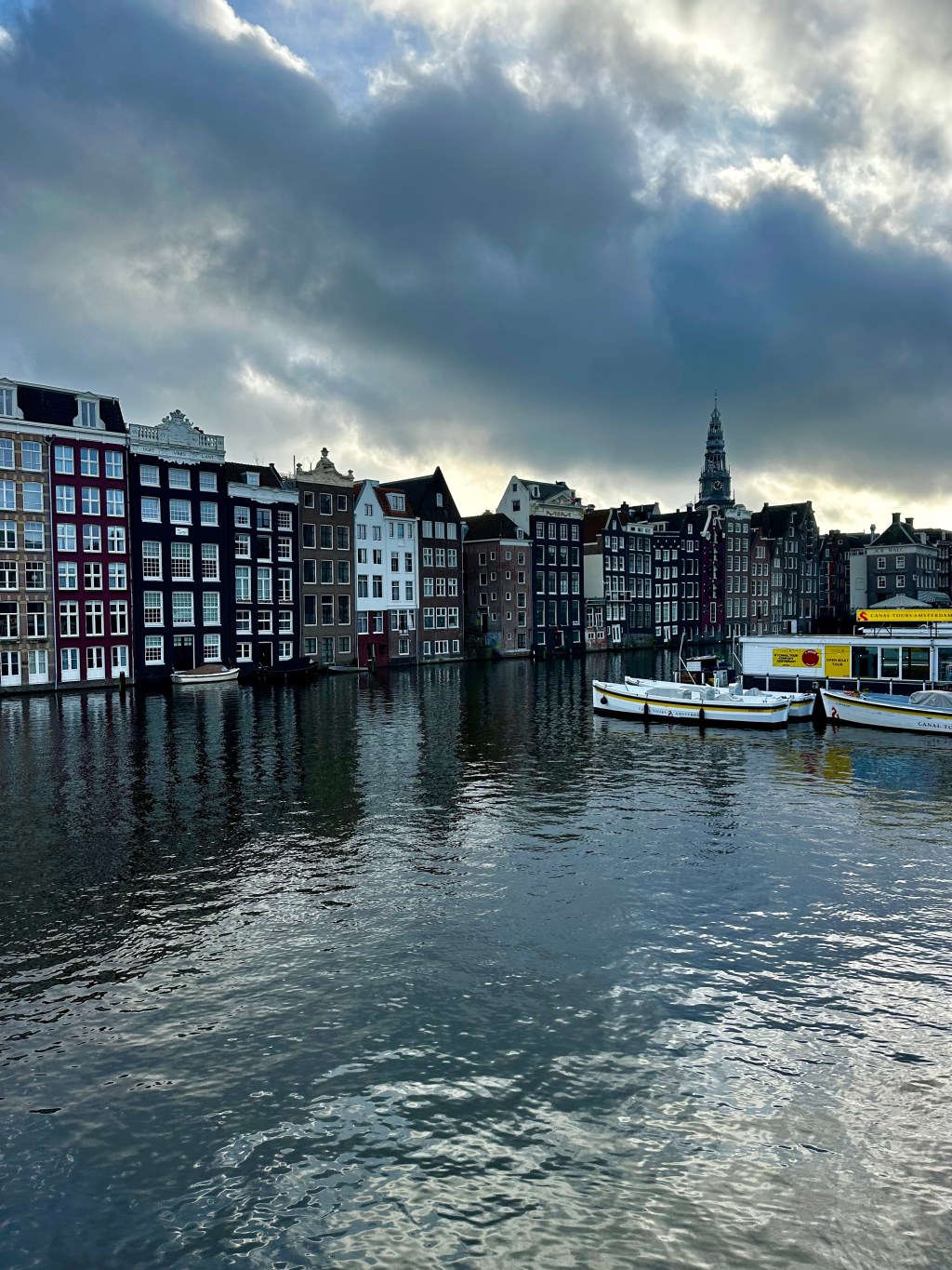 Canal with row of buildings in Amsterdam