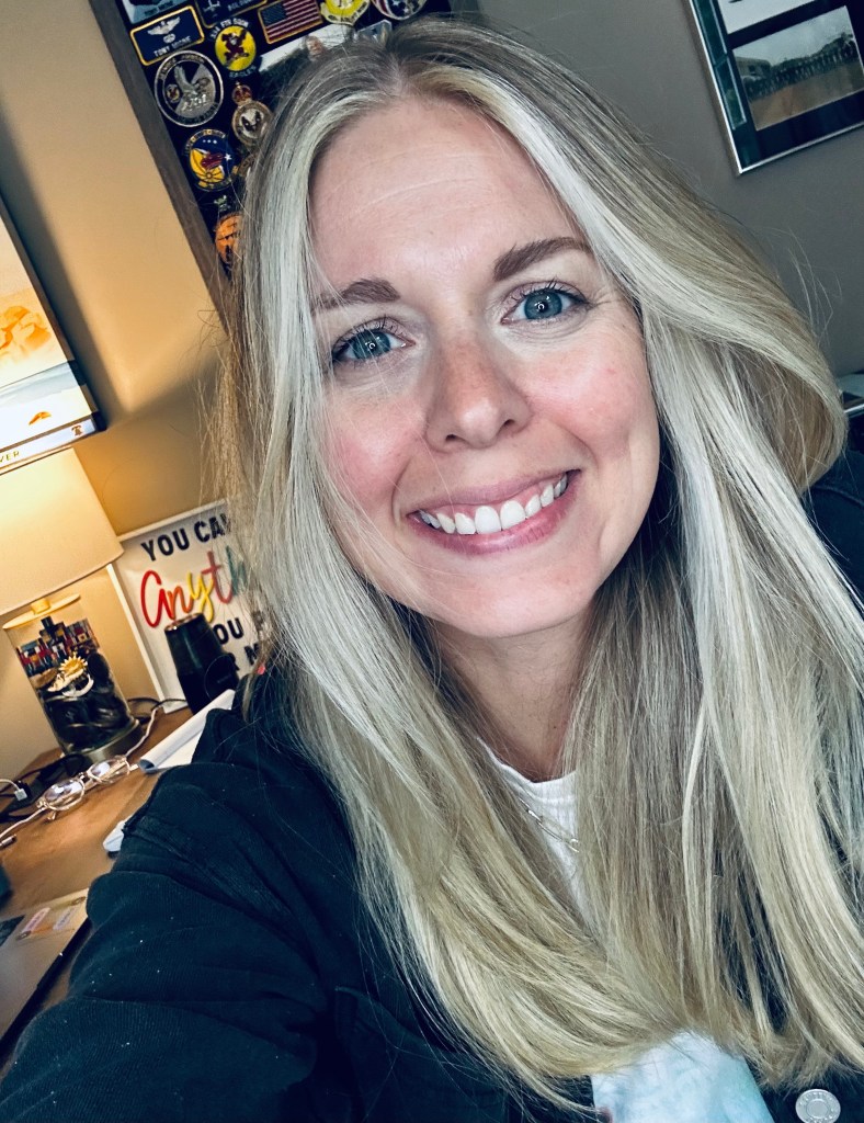 Picture for author sitting at her desk