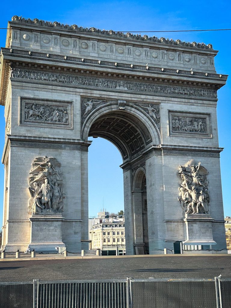 A close up photo of the Arc de Triomphe in Paris, France
